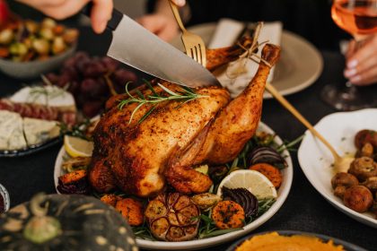 A delicious roasted chicken with vegetables, perfect for a holiday feast.