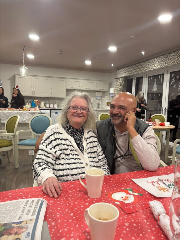 New resident Kathleen enjoying a warm welcome and spending time with a fellow resident at Bingley Park Care Home.