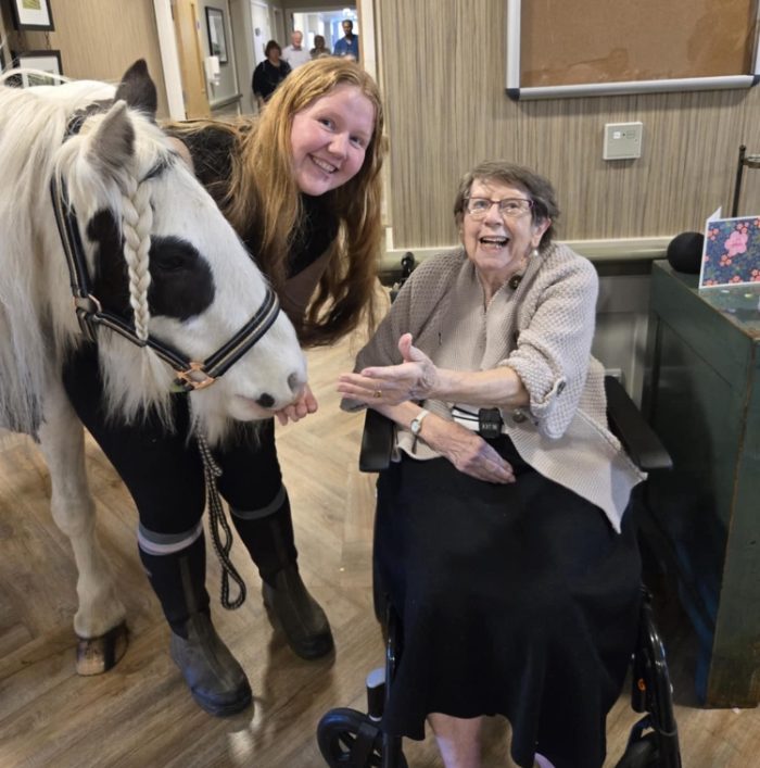 Care home resident with team member and a horse for open day at Beeston Rise 