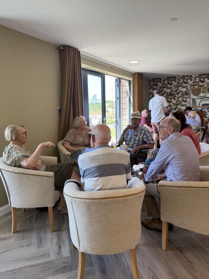 Care home residents enjoying themselves at trafford waters coffee morning