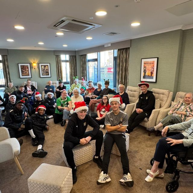Trent Bridge Care Home welcomes Notts County FC Youth Team for a festive morning of fun, connection, and Christmas cheer