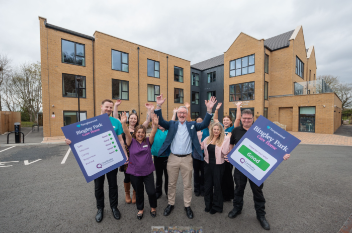 Staff celebrating outside Bingley Park Care Home in Bradford after achieving ‘Good’ CQC inspection rating