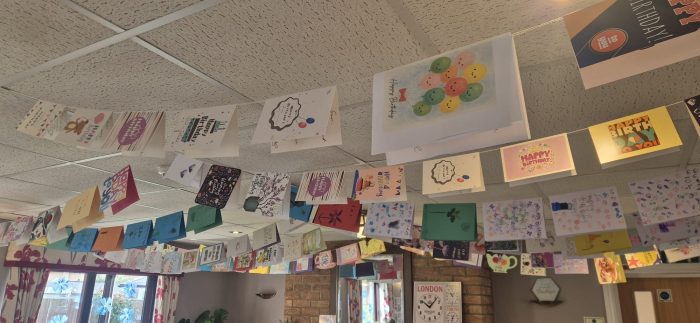 Gwen's birthday card bunting at Toray Pines care home in Coningsby